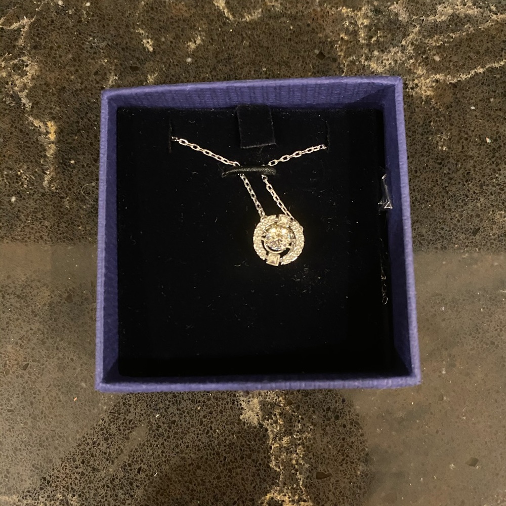 Swarovski crystal pendant new never worn